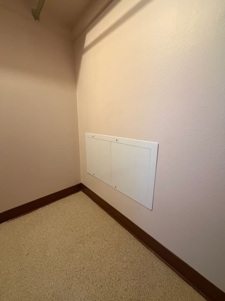 After: clean plumbing access panel installed in corner room — Oopsie Daisy Plumbing plumbing Northern Colorado